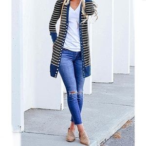 Black long and lean cardigan. Snap front closure. V nack great condition